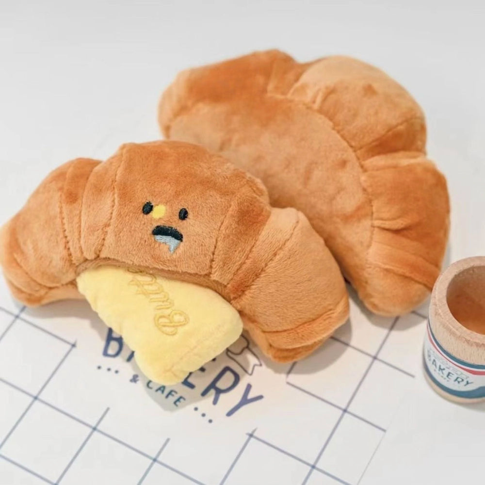 
                      
                        Butter Treat Dispenser Dog Toy: Squeak & Crinkle Fun
                      
                    
