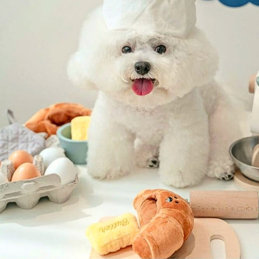 
                      
                        Butter Treat Dispenser Dog Toy: Squeak & Crinkle Fun
                      
                    